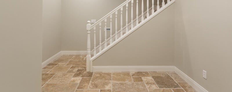 natural stone tiles on basement floor