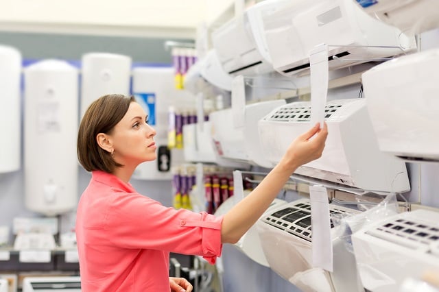 woman shopping for the best air conditioner