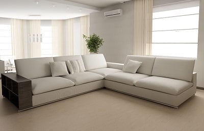 White upholstered couch in a living room