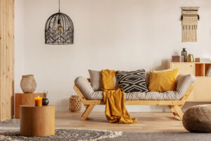 living room with chandelier and yellow accents