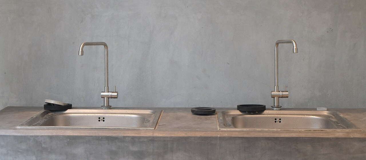 grey and stainless steel utility sink