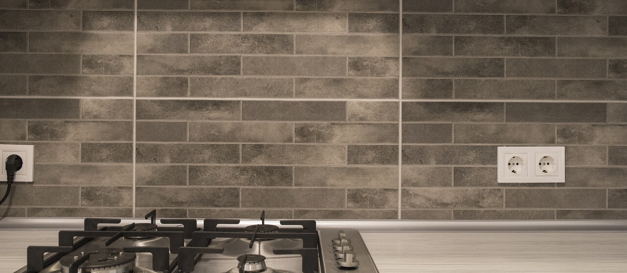 brick backsplash in a kitchen