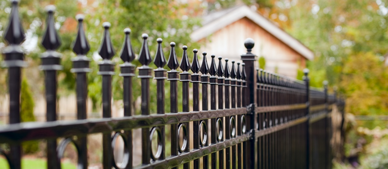 close up of wrought iron fence