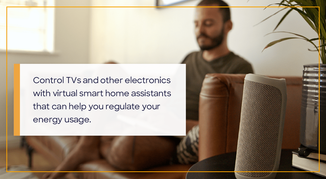 Man sitting on couch and listening to music from speakers