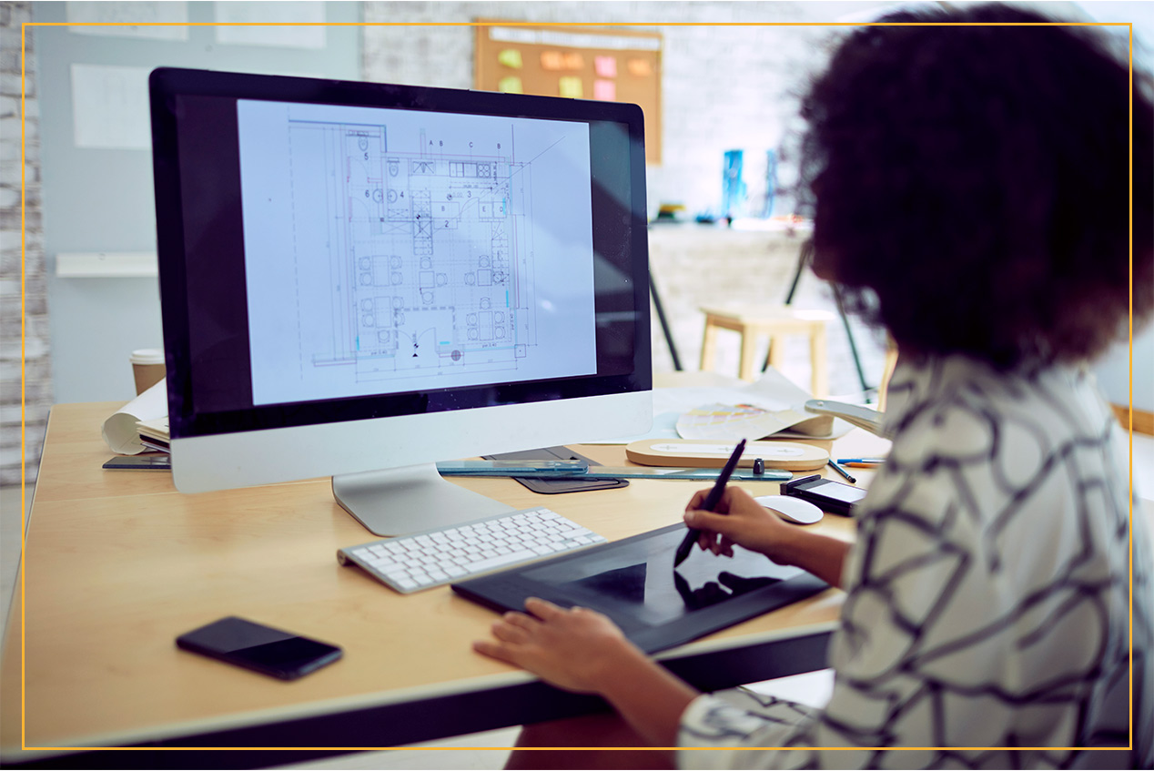 architect drawing on tablet for computer