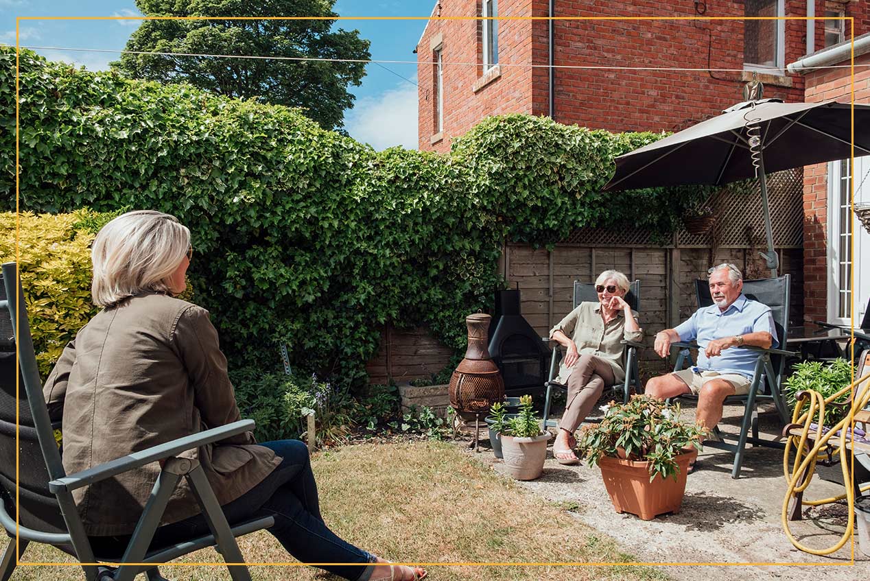 group lounging in backyard