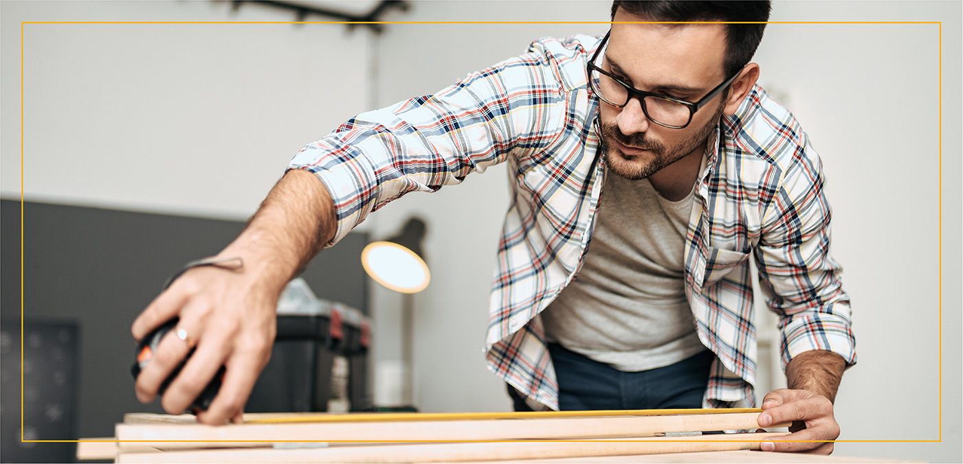 man constructing a table