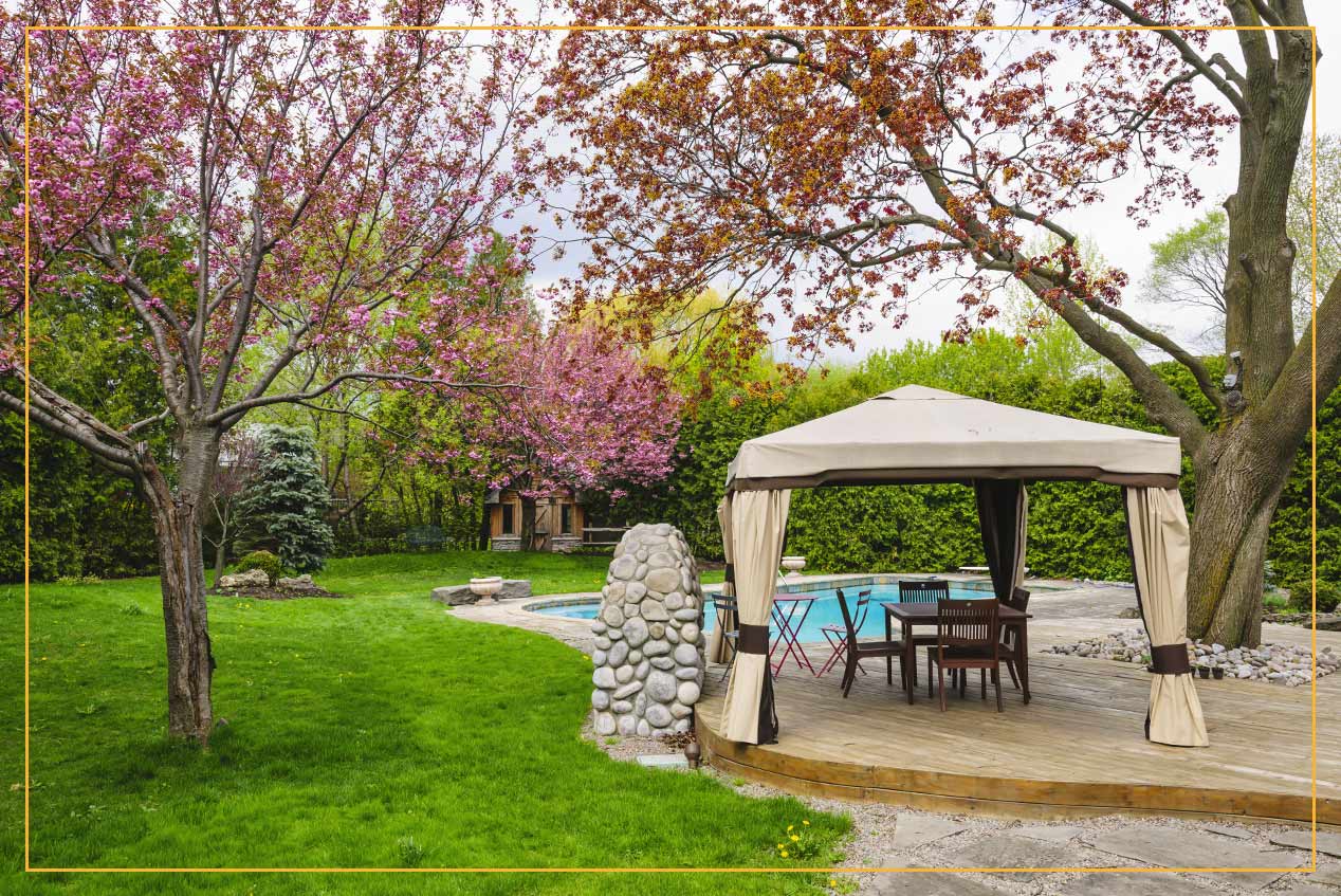 portable gazebo in backyard by pool