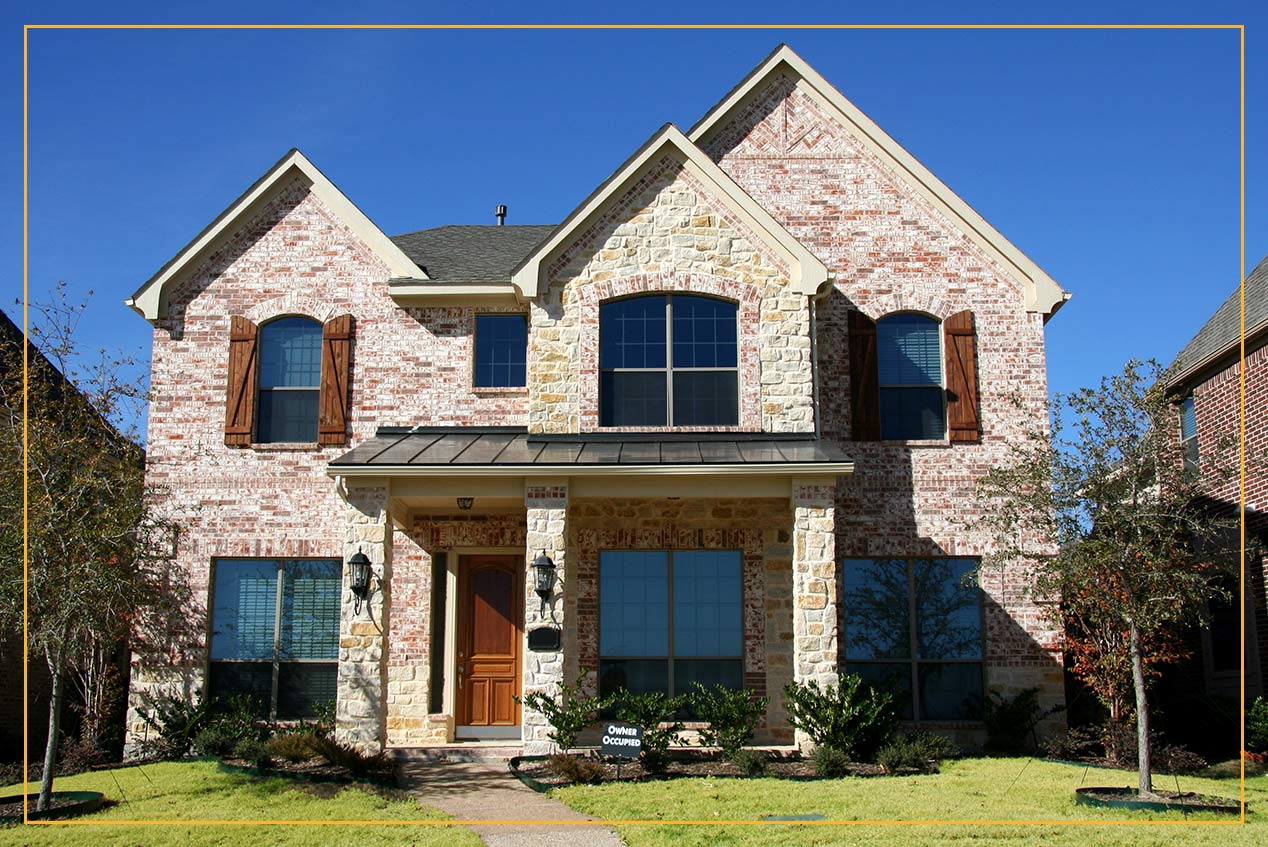 Stone and brick home in suburbs