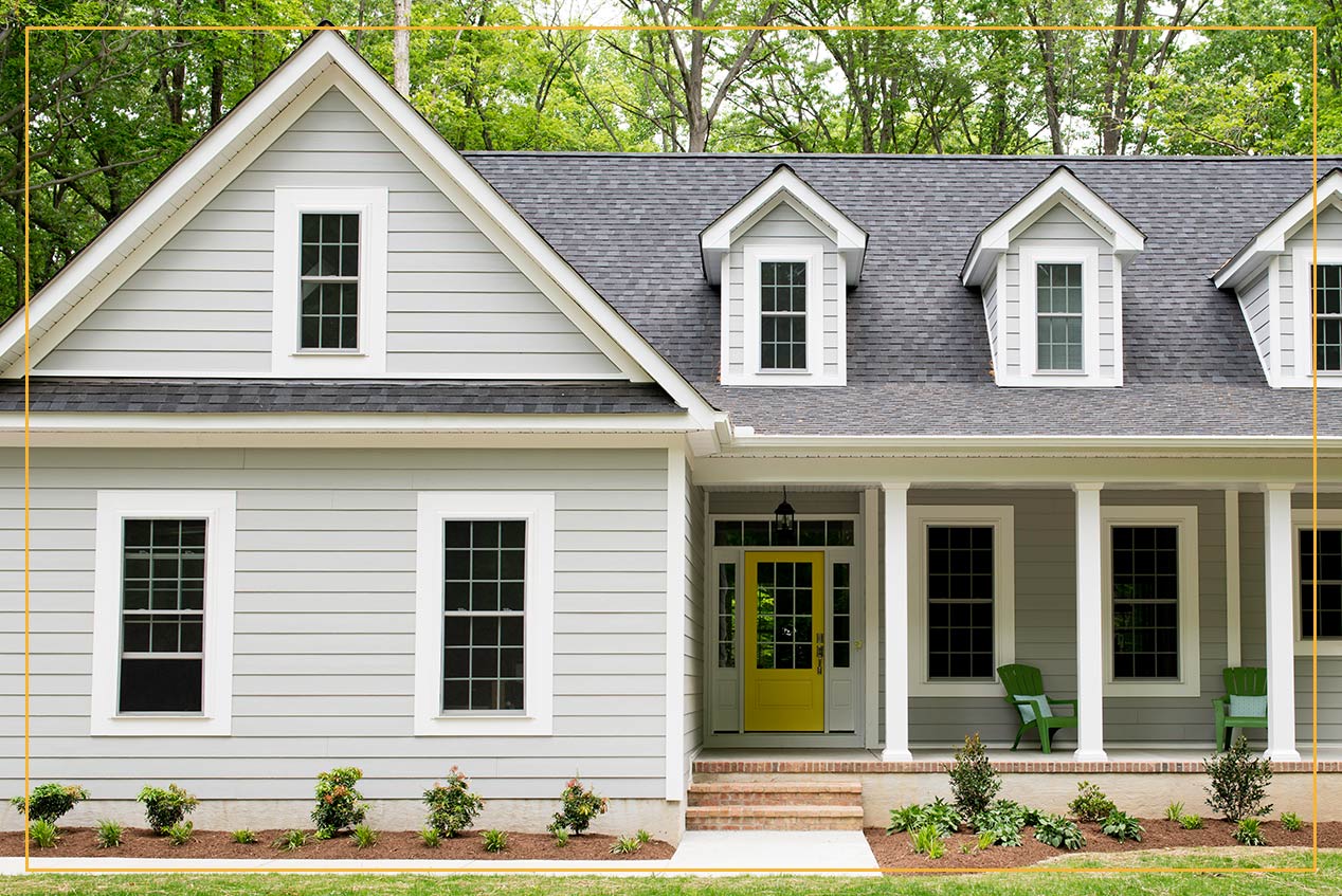 Suburban gray siding home