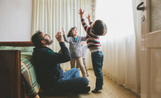 A man having fun with his children