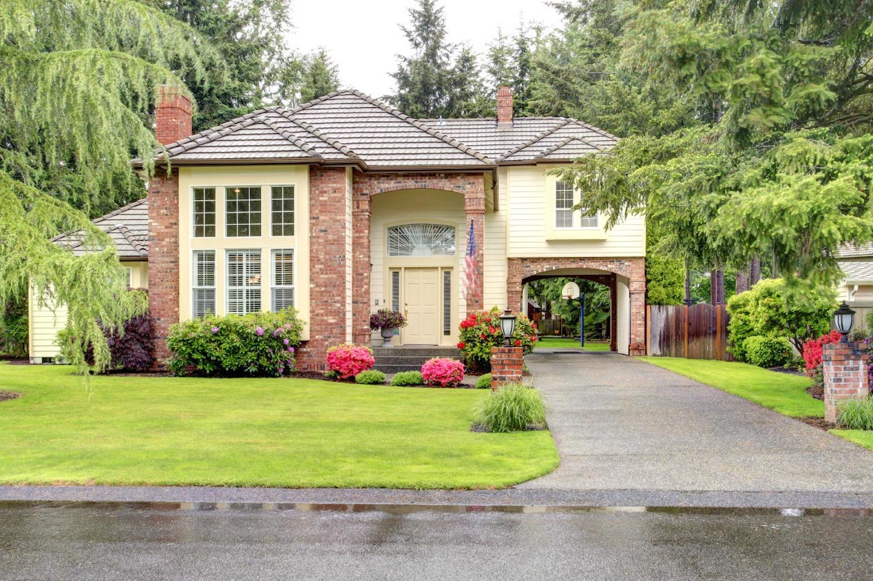 A brick house with siding